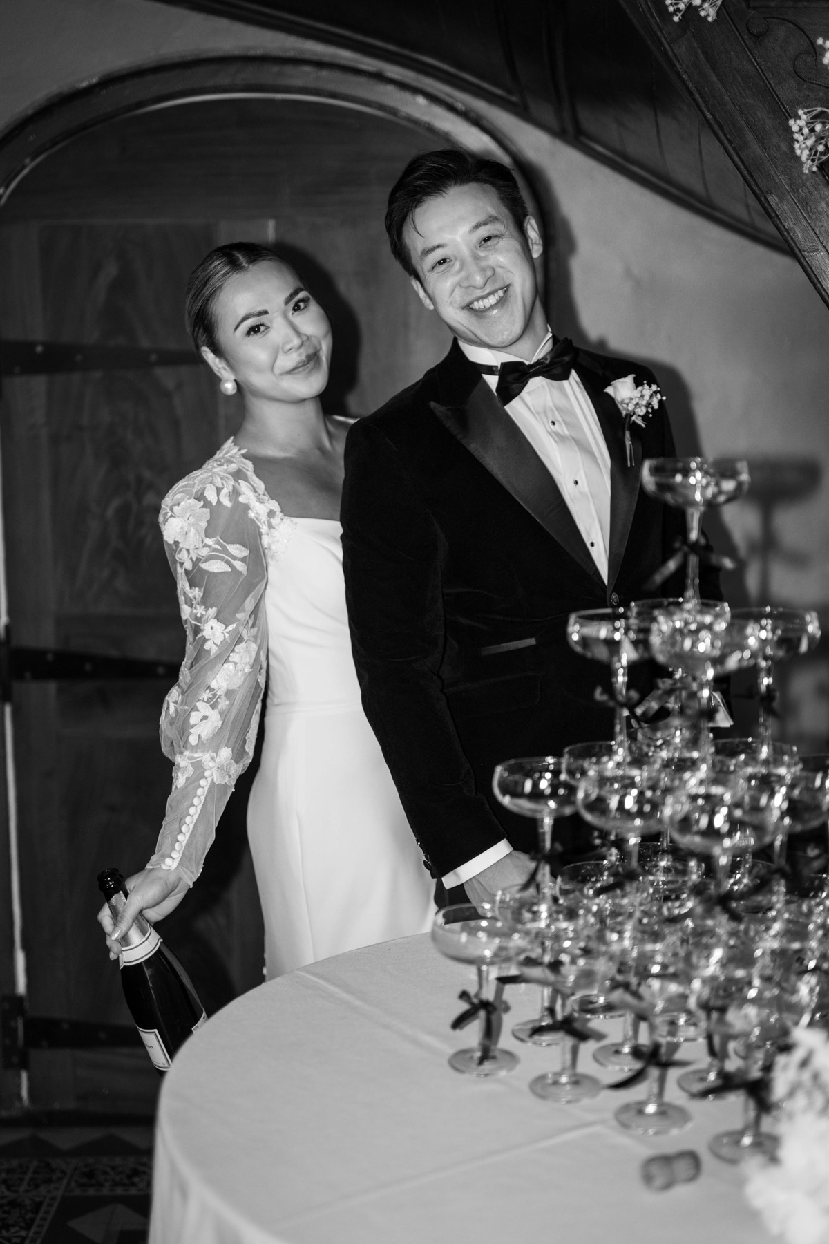 Guests raising a toast at a celebration at Glewstone Court
