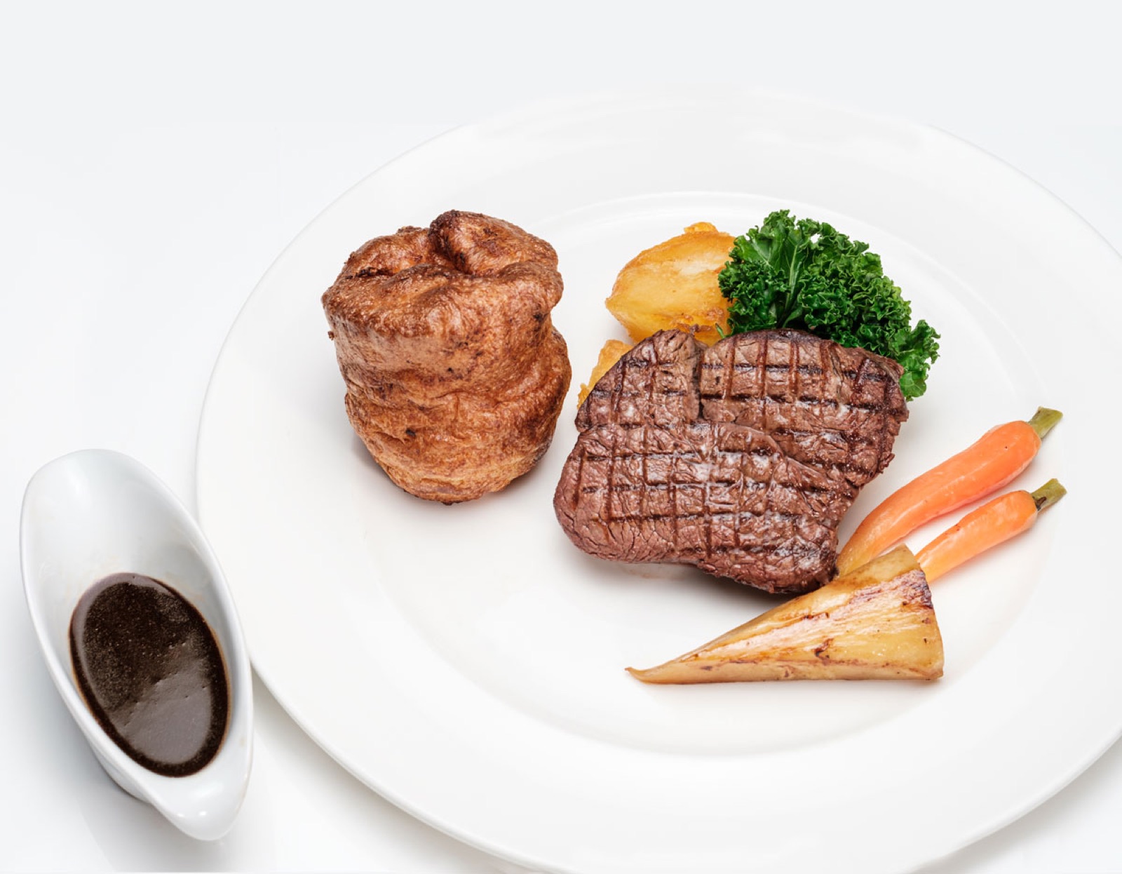 A signature main course from the Glewstone kitchen, roast fillet of Hereford beef with Yorkshire pudding, roast potatoes and seasonal vegetables